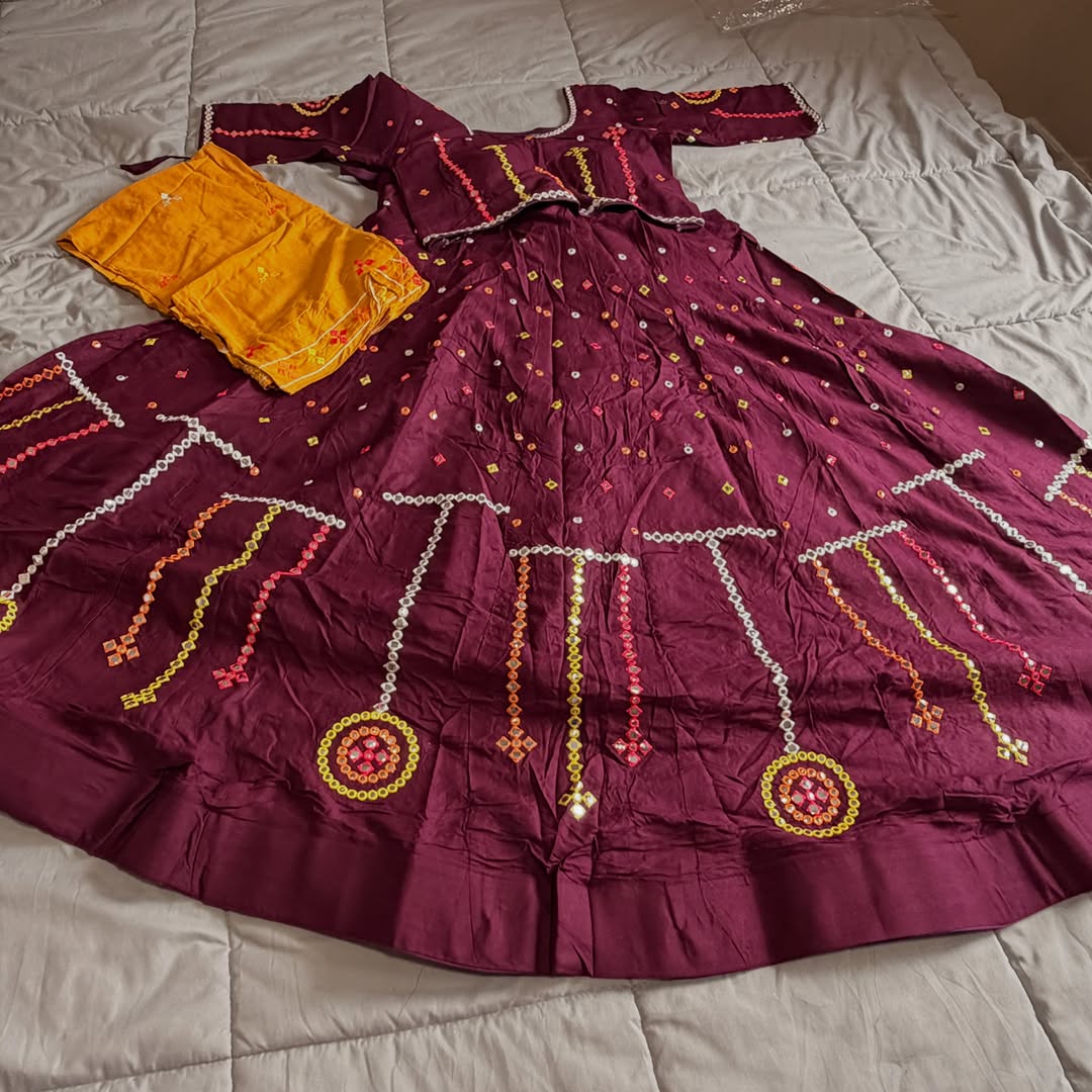 Wine coloured chaniya choli with abla mirror work